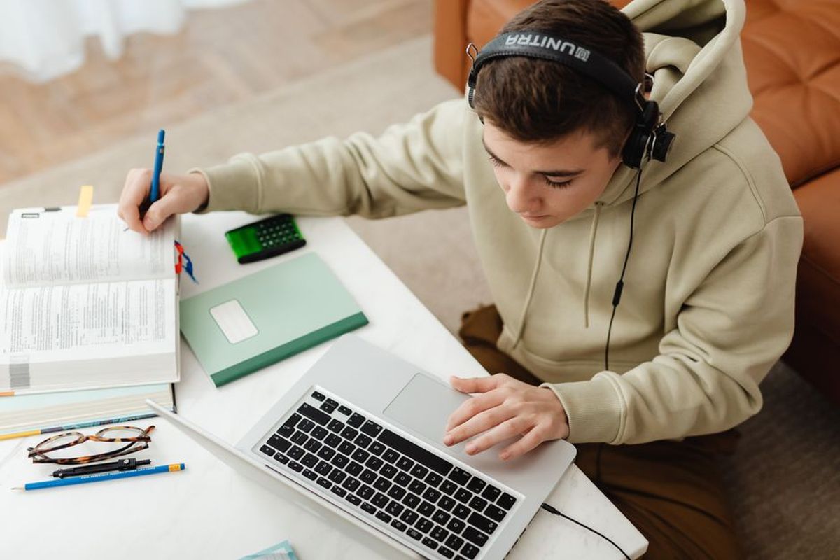 Parent browsing tutor profiles online
